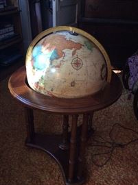 Vintage Butler lighted globe on stand