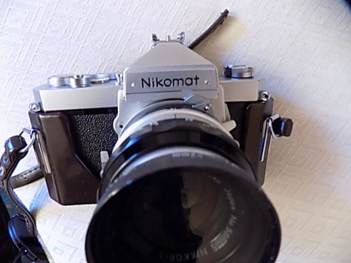 Nikomat Camera with 3 lenses