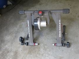 Indoor bike stand.  Allows you to ride your bike in stationary position.