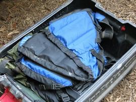 Fold up seats and life vests for the canoe.