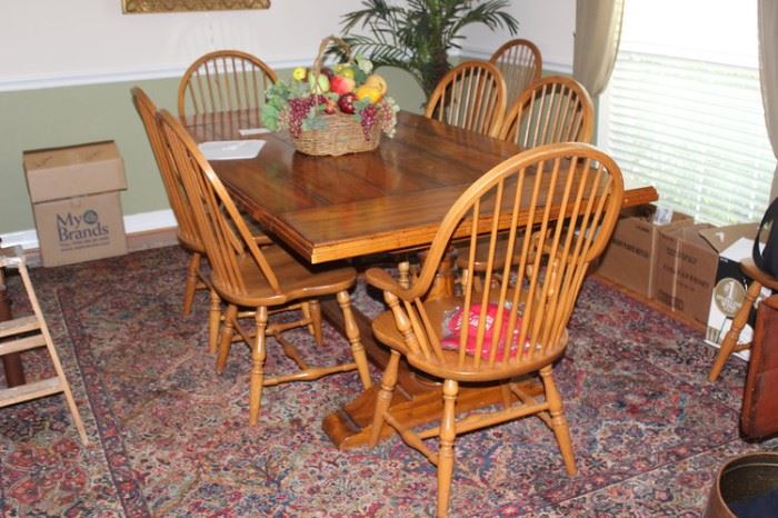 Solid Wood Trestle Table                                                      8 Chairs, very nice rug recently refringed 