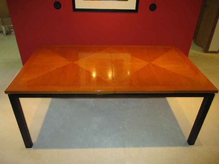 Amazing vintage Baker dining table with three 18" leaves, center support leg and table pads.  Custom storage box for leaves and pads included.