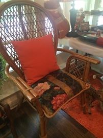 One of two identical rattan chairs