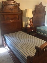 Exceptional antique East Lake twin beds