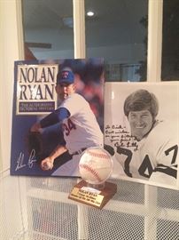 Nolan Ryan book and autographed baseball; autographed picture of Bob Lilly