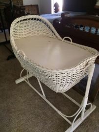 Precious white wicker bassinet 