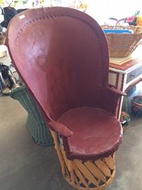 One of two leather and bamboo chairs from Tlaquepaque, Mexico