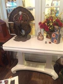Antique table painted white; mounted turkey & other decor