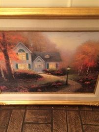 Framed art by Thomas Kinkade