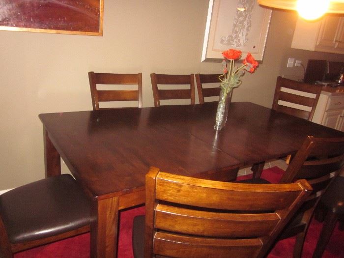 Kitchen table and 8 chairs. 