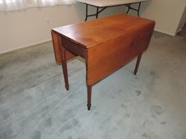One of several drop leaf tables