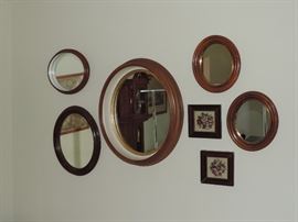 Hard to tell...but the mirror in the middle is nearly 20 inches high !