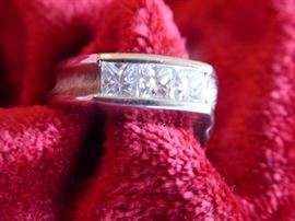 14k, three 1/3 ct brilliant cut diamonds