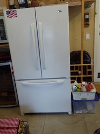 25 cf Amana refrigerator over freezer. Like new.
