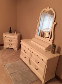 The mirror is priced separately. It opens on the bottom for jewelry and other small item storage. Super heavy, great quality furniture.