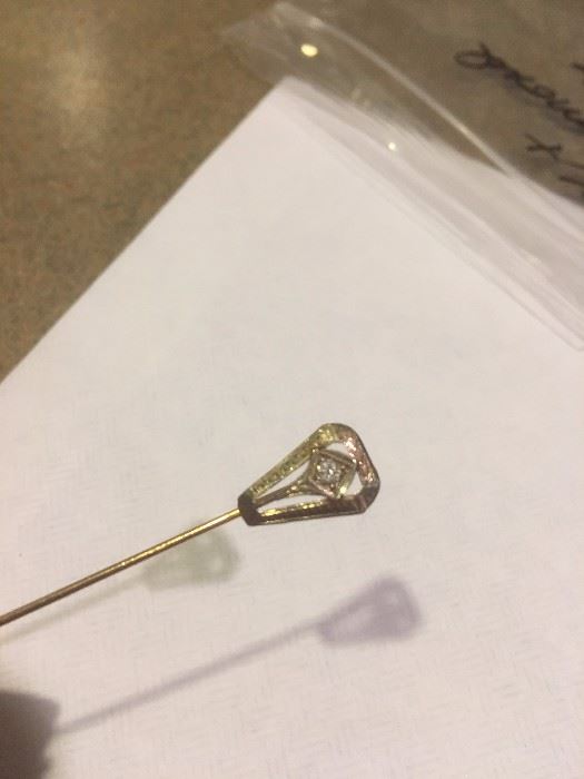 14K Gold and Diamond stick pin. One of the many pieces of tasteful jewelry.