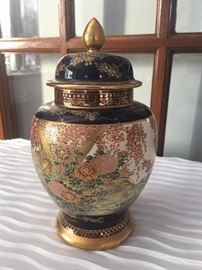 Very fine hand painted urn.
