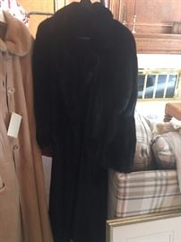 Timeless design on this long and luxurious mink coat. You MUST try it on.
