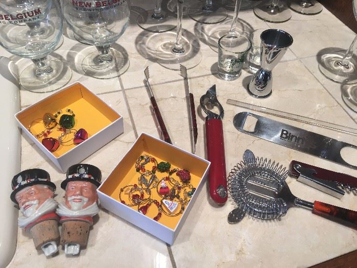 Vintage Beefeater stoppers, wine charms, and bar essentials.