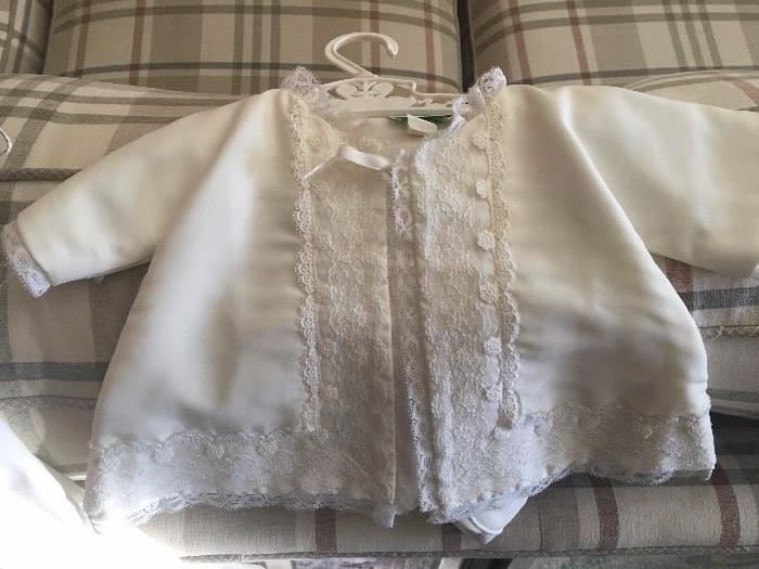 An assortment of vintage Christening outfits by Schwartz and Baby Dior.