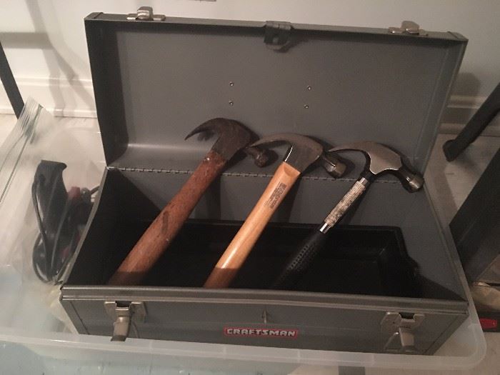 Craftsman tool box and hammers.