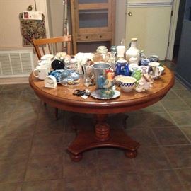 Ethan Allen dining table with leaves and 8 farm chairs