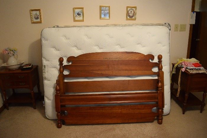 Solid cherry full size headboard and footboard. Other pieces in the bedroom are part of a suite, but will be sold separately. Simmons mattress and box spring in great condition. 