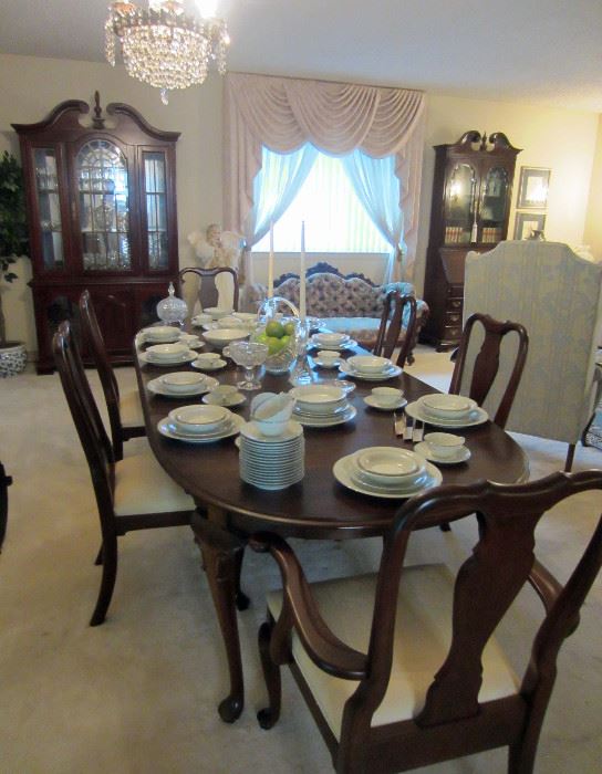 ETHAN ALLEN DINING SET .... side chairs SELL for about $250 on eBay.  Table, two leaves, and six chairs (two arm, four side).  Other pieces sold separately. 