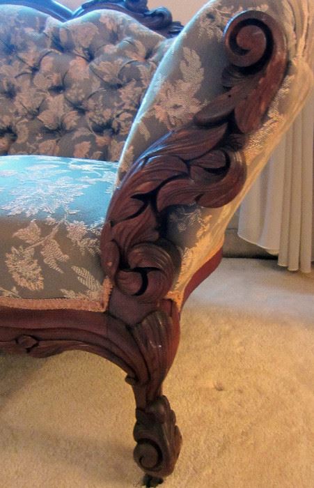 Victorian sofa carved wood detail