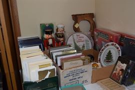 Christmas cards and Nutcrackers. The wooden object in the back is a violin mold.