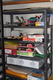 Many office supplies including paper, envelopes, writing utensils, three hole pinches, filing folders and more!