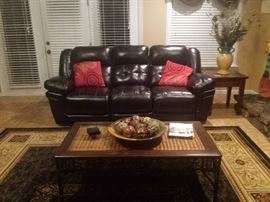 Ashley leather espresso sofa, coffee table, end table, rug