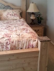 king bed, nightstand, lamps (2), greenery