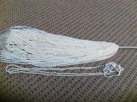 This strand of pearls ensures you will have enough for all the women in your life. Approx. 15" in length, this lot includes 50 strands. String them together for a longer necklace or group them to make a "rope" necklace. A lovely addition to any woman's jewelry box or any jewelry maker's inventory.