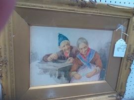 This Italian watercolor is signed Gianni. Loving couple seated at a table smile at what may be a photo or letter in the woman's hands. Image approx. 9 1/2" x 13 3/4", with frame 17 1/2" x 21 3/4".