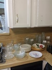 Kitchen plates, bowls and utensils