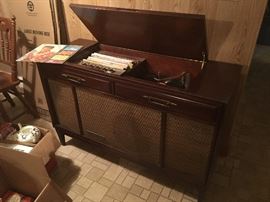 1960's Motoralo Turntable console, works perfectly.  Music will be playing when you come in!!