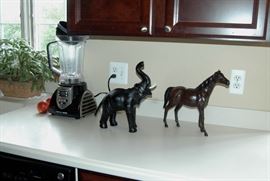 Leather horse and elephant