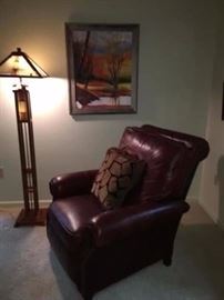  Leather recliner, acrylic painting, floor lamp