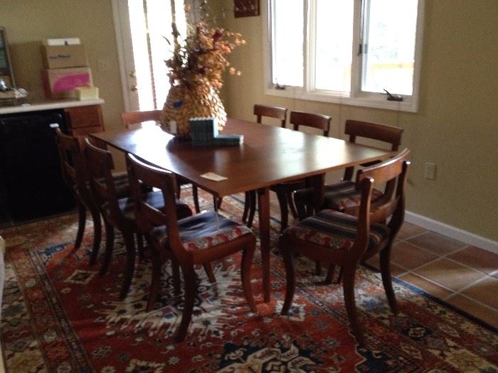 Dining table and 8 chairs, Kazak oriental rug