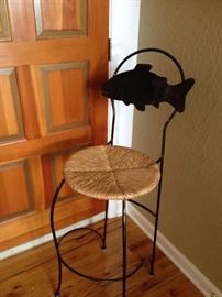 One of a pair of unusual metal fish bar chairs