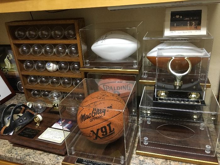 Signed Basketballs: David Robinson and team signed Texas Longhorns basketball 1989-1990. signed footlballs : Troy Aikman and Barry Sanders