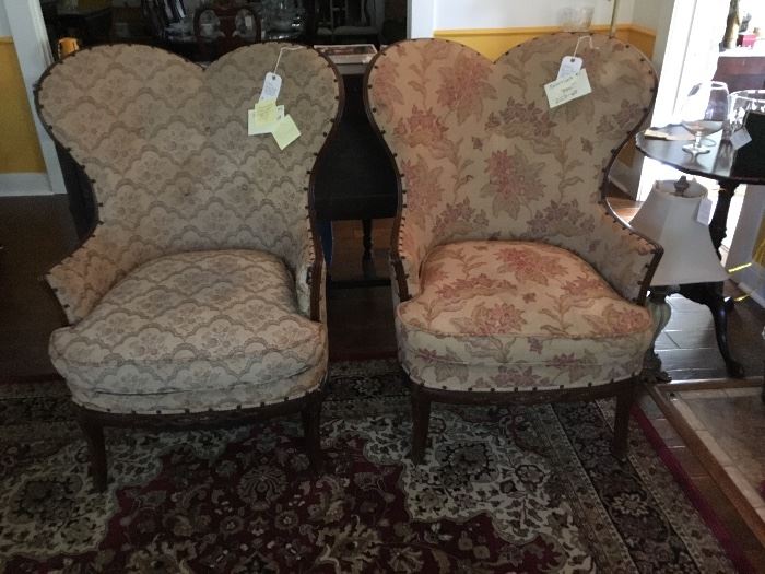 rare double camel back wing chairs , 