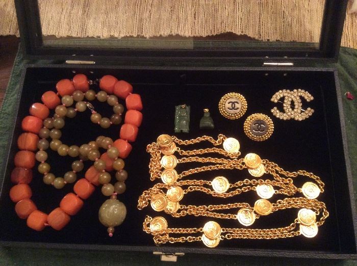 Stunning vintage jewelry, including amber, jade and rare vintage Chanel coin necklace, pin and earrings