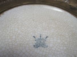 Marking on bottom of  cache pots- 1897