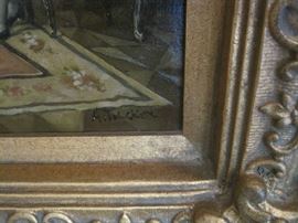 Artist's signature, A. Tucker, on painting of people in the parlor 