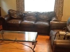 2 piece Leather Sofa and glass coffee table