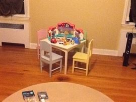 Children's table set with Fisher Price toys