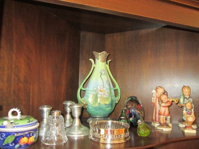 Hummels, made in Japan vase, weighted sterling candle sticks and other knick knacks.