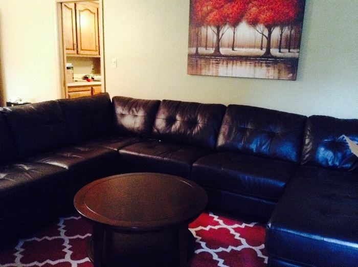 Large leather sectional...measure your space before you come!